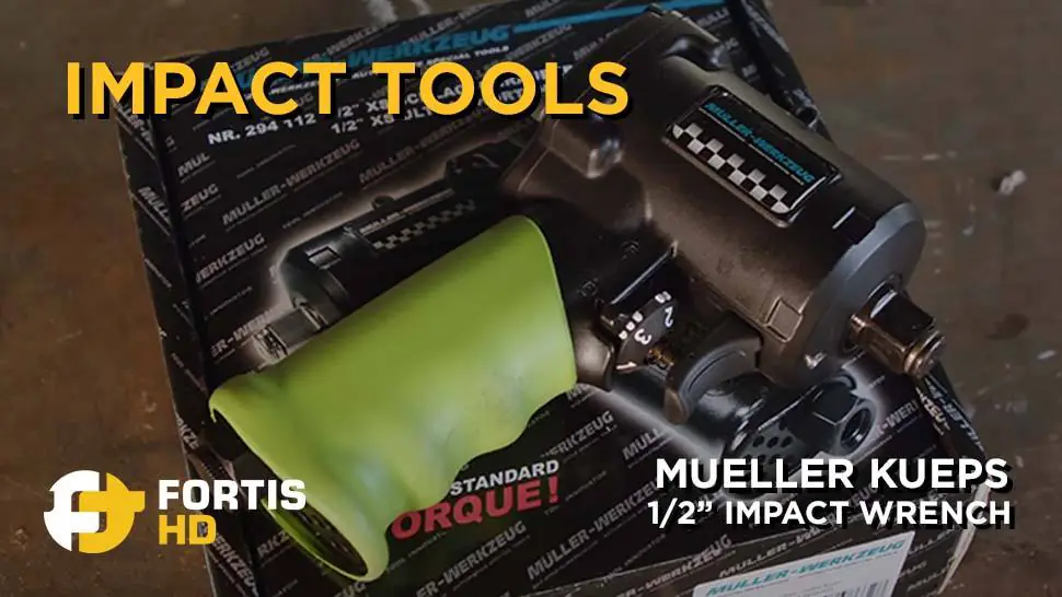 A Mueller Kueps 1/2‘’ impact wrench lays on its box.